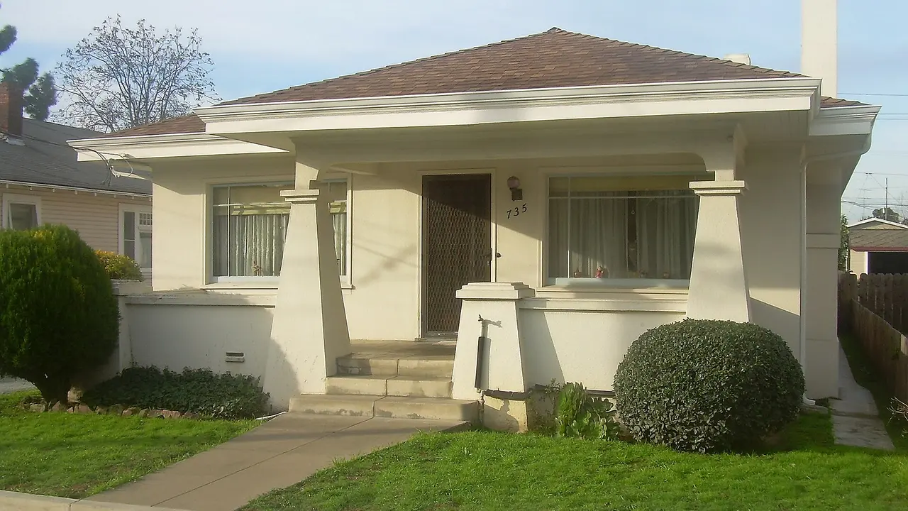 Stucco California bungalow with a front porch