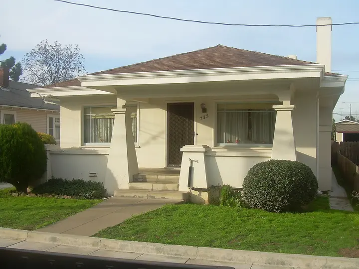Stucco California bungalow with a front porch