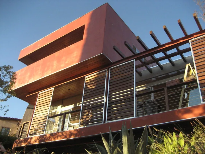 Modern home with colored stucco walls